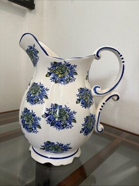 Classic White Ceramic Pitcher with Blue and Green Floral Pattern
